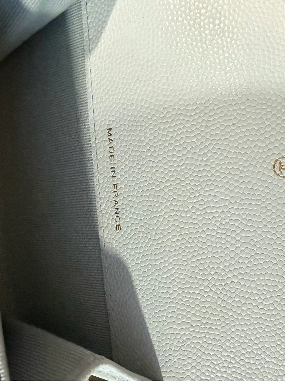 Chanel shiny caviar quilted crystal CC flap card holder light blue